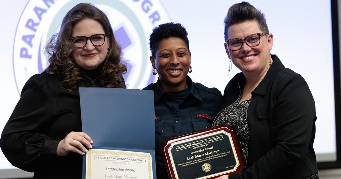 Dr. Ogle and colleagues showing their awards